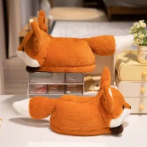 chaussons renard vu de profil avec une grande queue orange et blanche