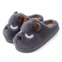 Chausson Chien Grognon bleu avec des yeux blancs et des petites oreilles marrons