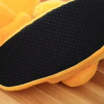 Pantoufle en forme de canard avec semelle antidérapante noire à picots